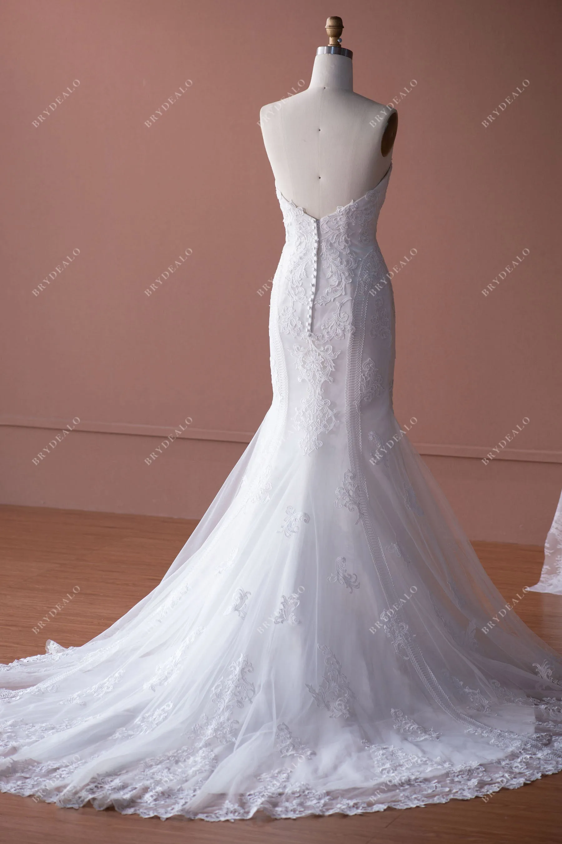 Elegant Strapless Lace Mermaid Designer Wedding Dress with Long Train